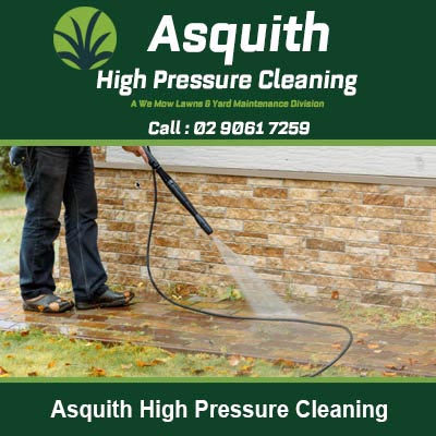 Person using pressure washer to clean in Asquith