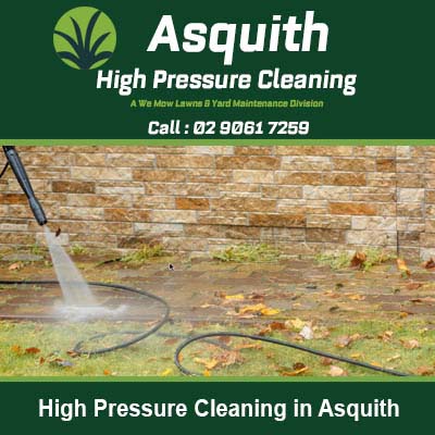Pressure washer cleaning a brick wall in Asquith