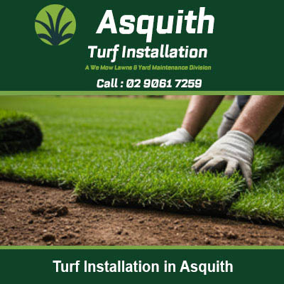 Hands in work gloves placing fresh turf in Asquith